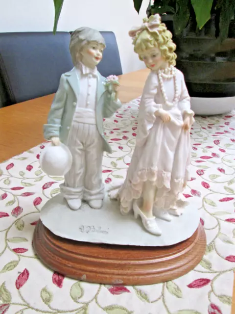 A Belcari Vintage  Capodimonte Dear 1984 Figurine Boy Girl Playing Dress Up