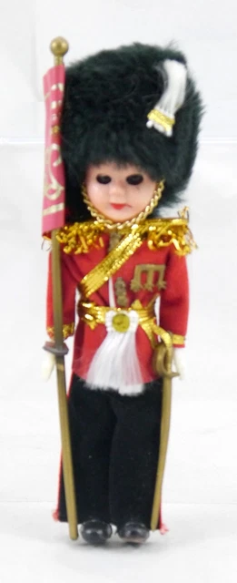 Vintage English Royal Guard Souvenir Doll. Eyes Open, Close. w Flag & Sword. 6"