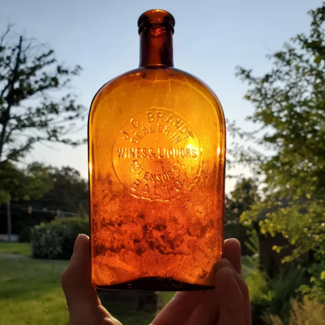 J.C. Brandt Amber Pint Strap Side Antique Whiskey Flask from Baltimore MD
