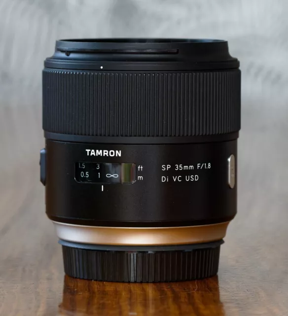 Tamron SP 35mm f/1.8 Di VC USD Lens for Canon EF. Excellent with box, hood, caps