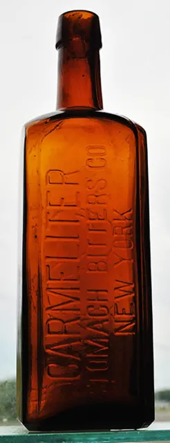 Bitters Bottle, embossed on front “CARMELITER / STOMACH BITTERS CO. / NEW YORK