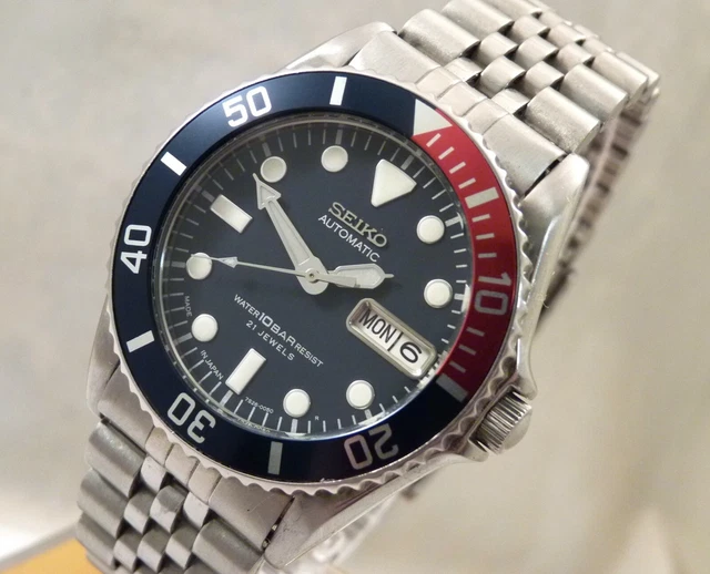 SEIKO SKX025 DARK Blue Pepsi Midsize Day Date Automatic Watch