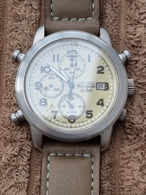 Montre Seiko 7T32-5A10 SQ100 - Chronographe Quartz, Affichage Jour/date, état Très Bon