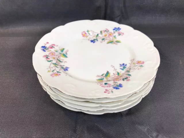Lot de 5 petites assiettes à dessert en porcelaine décor de fleurs début 20ème
