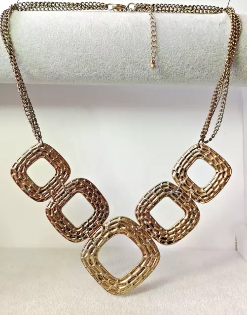 "ZE24"--gold tone multi--chain arts & crafts style v-shaped necklace