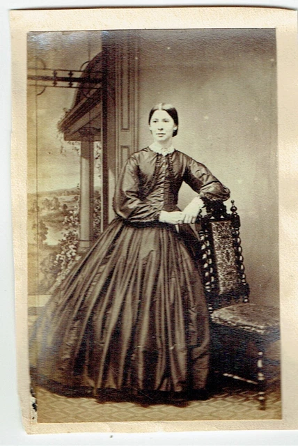 Victorian cdv type photo young woman standing long dress elbow on chair