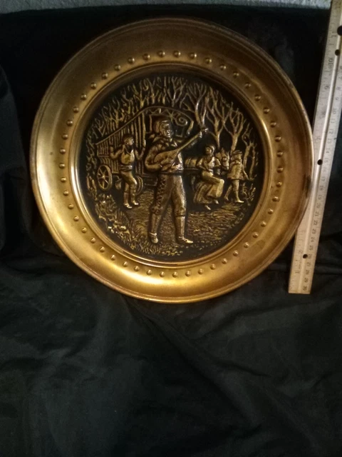 Vintage brass embossed charger flue pipe cover plate repousse metal wall hanging