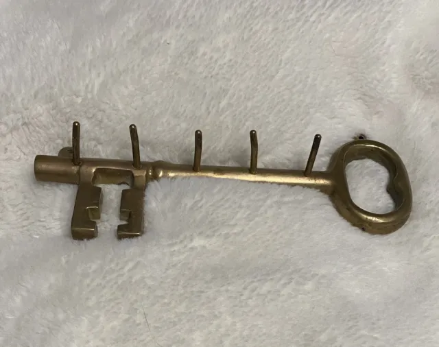 Vintage brass key shaped 5 wall hooks key hanger.  Victorian style decor.