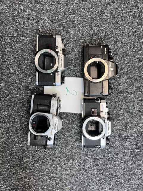 Job lot Cameras -  Canon , Olympus Praktica