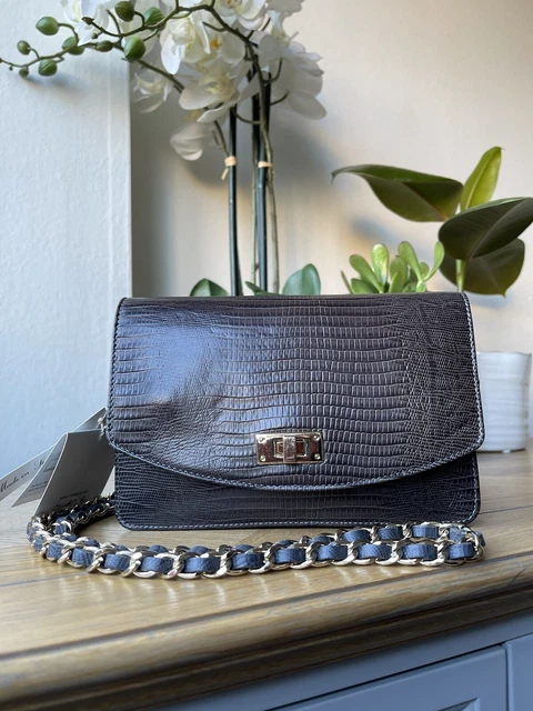 Uterque sales clutch bag