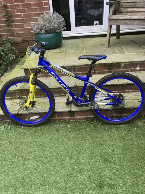 Blue and yellow carrera bike hotsell