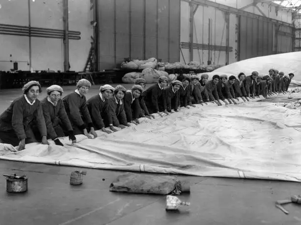 Line Of Ladies Rolling The Fabric Of The Zeppelin Air Aviation History Old Photo