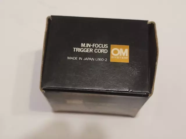 Olympus OM system M.IN-FOCUS TRIGGER CORD MINT in its box with instuctions