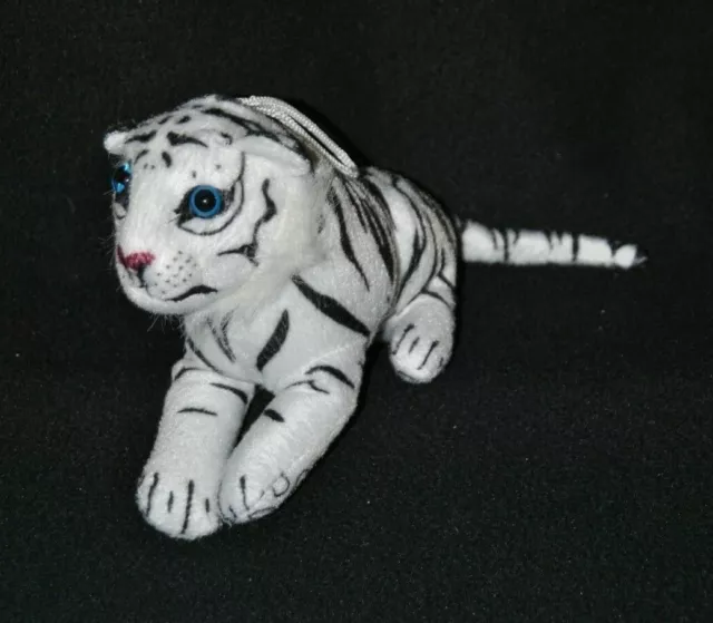 Peluche doudou tigre blanc noirs yeux bleu durs 18 cm de long TTBE