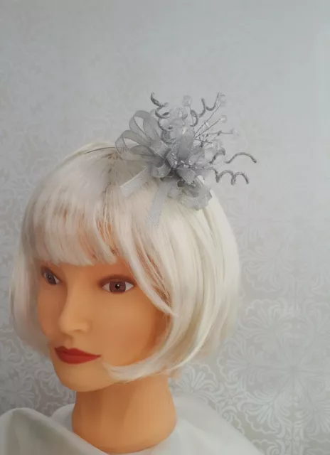 Shimmer silver Fascinator/ clear jewels/head band/new/boxed