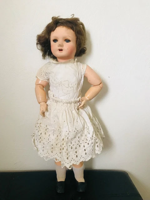 poupée ancienne vendu avec ses vêtements et ses petites chaussures 50 cm 