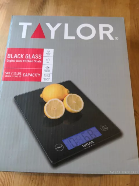 https://www.picclickimg.com/WSoAAOSwCbZiKNDm/Taylor-Black-Glass-Digital-Dual-Kitchen-Scale-Black.webp