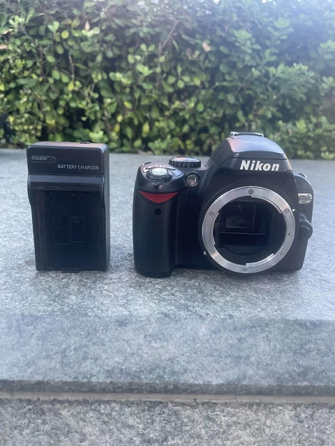 Nikon D40X 10.2 MP Digital SLR Camera - Black (Body Only) + Charger OEM Battery
