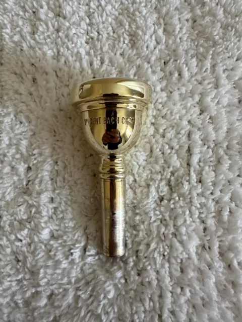 Vincent Bach Corp 7 small shank trombone mouthpiece in gold plate