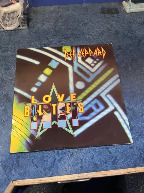 Def Leppard: Love Bites, 1988, 12”, Bludgeon Riffola