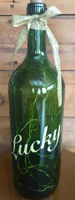‘Lucky’ gold sparkle die cut vinyl logo large green lighted wine bottle