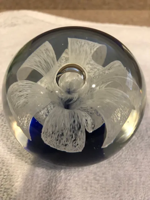 Vintage Art Glass Paperweight In Clear and Blue with White Flower unsigned