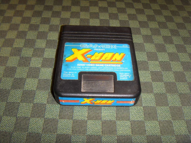 Jeu Atari 2600 X-Man SECAM - Avec Boîte Partielle Dans Boîtier Cassette VHS