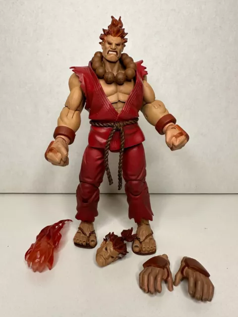 Series 4 Akuma Action Figure, Codllyne Akuma Red Hair and Blue Outfit  action figure. You might not be able to defeat Akuma in battle, but you can  own him as pa 