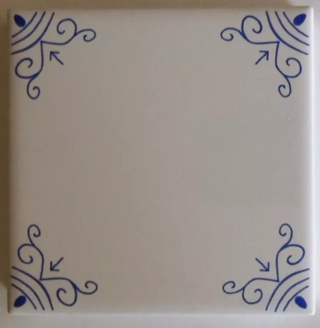 White Wall Tiles with Blue Ox Tail Delft Style design