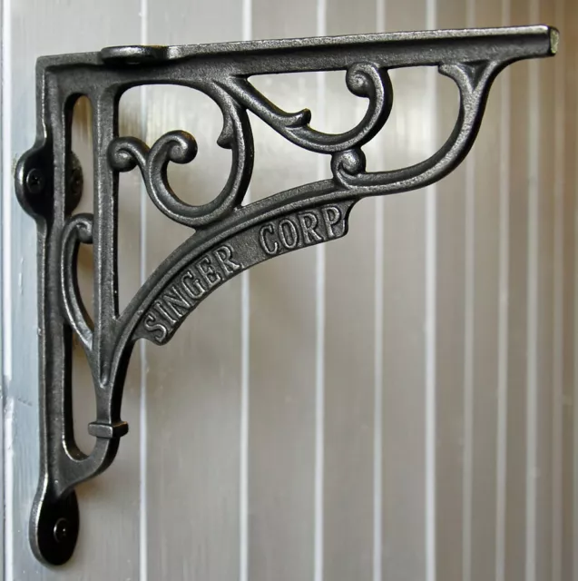 Cast metal vintage style Singer Corporation wall shelf bracket