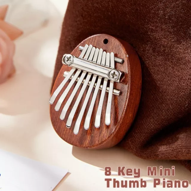8 Keys Mini Finger Kalimba Thumb Piano Portable Beginners Keyboard Mbira Pendant