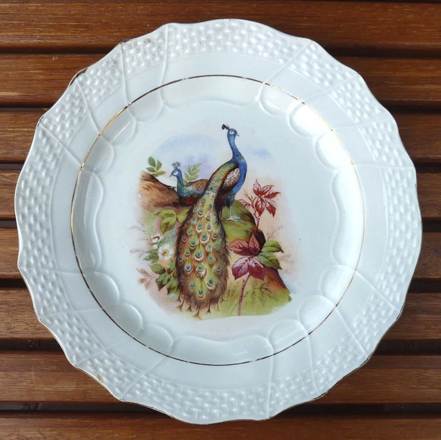 Assiette à dessert en faïence de Moulin des Loups, décor paon