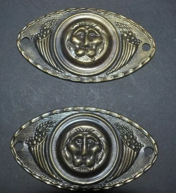 A pair of Vintage Lion Head Brass Furniture Ormolu Hardware - Handle Backplates