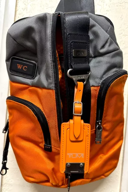 Tumi Montery Sling  Crossbody Bag 22318GOH Orange Gray - Used