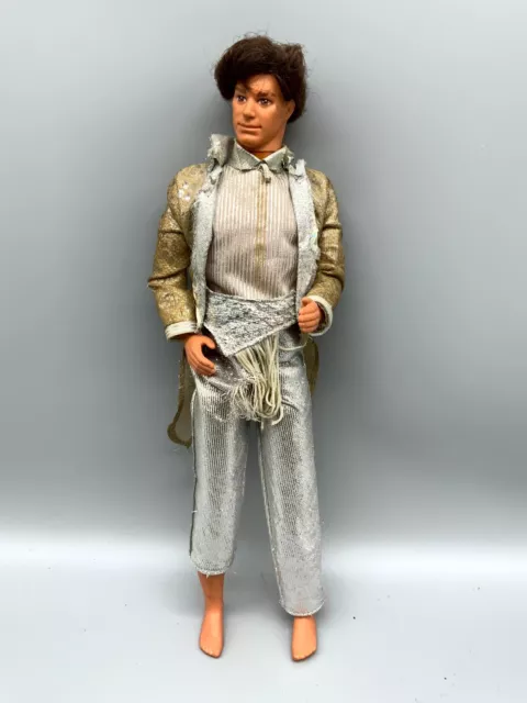 Puppe aus Kunststoff, 1986 Mattel. Kleidung und Haare leicht berieben 29cm