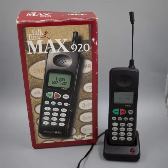Teléfono celular vintage de finales de 1990 NEC barra de caramelo antena extraíble negra