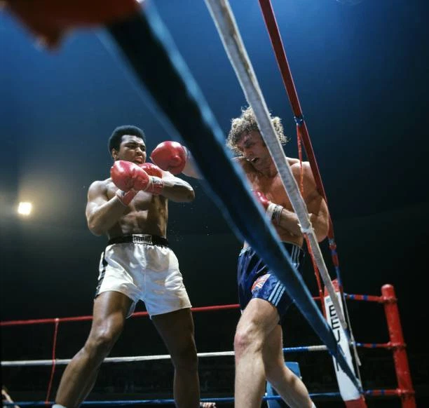 MUHAMMAD ALI IN action vs Joe Bugner during fight at Las Veg - 1973 Old