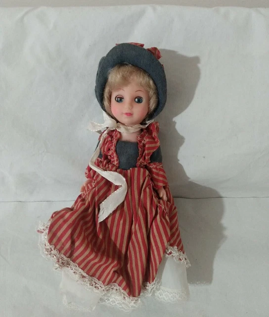 Vintage Doll Blonde Hair Blue Sleepy Eyes With Red Striped Dress And Blue Hat