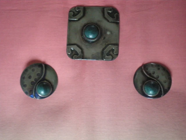 large studio brooch and earring set.