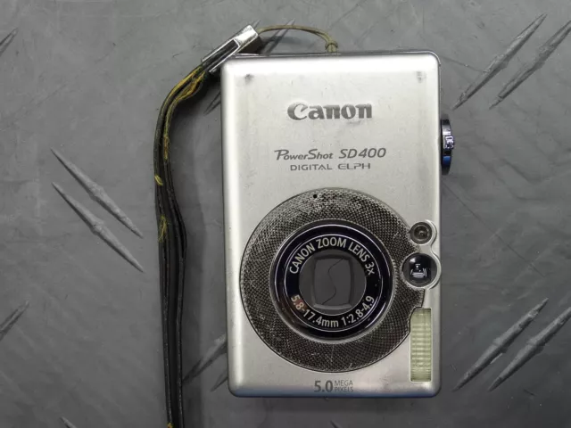 Canon PowerShot SD400 Digital ELPH 5 MP Digital Camera + Canon Leather Case