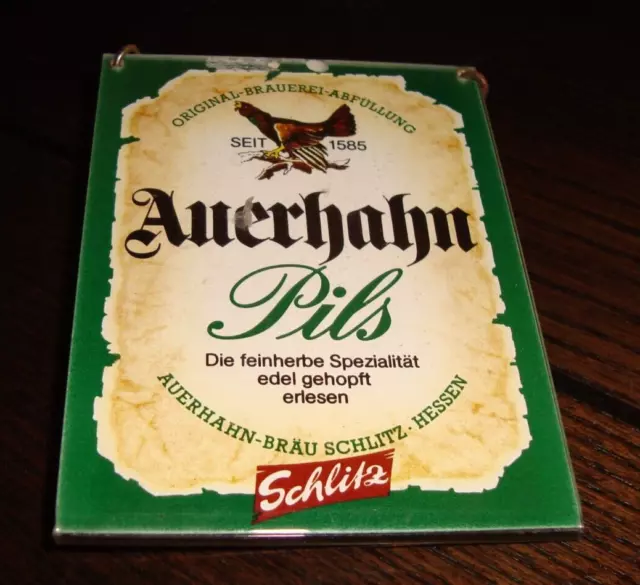 Zapfhahnschild der Brauerei Schlitz, Auerhahn Pils