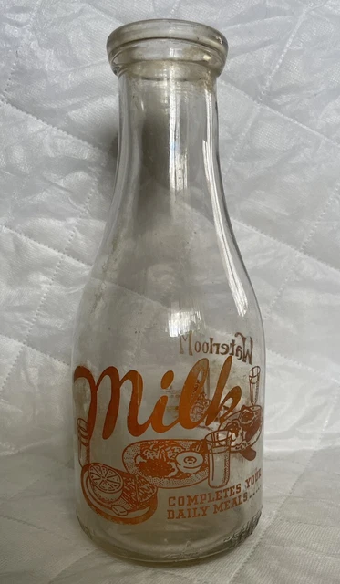 1 Qt. Waterloo milk company bottle. Sealed in 1952. Beautiful graphics.