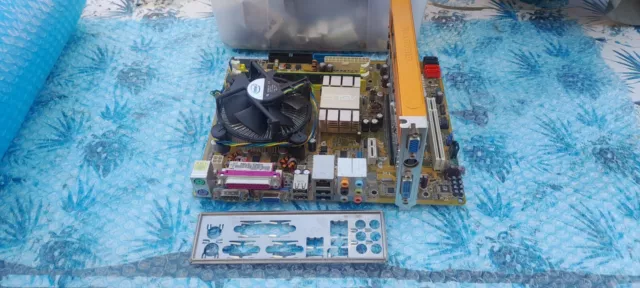 Used & UNTESTED ASUS PSKPL-CM MOTHERBOARD + CPU + RAM & GRAPHICS CARD.