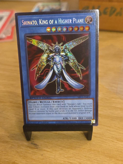 Yu-Gi-Oh! Karte „Shinato, King Of A Higher Plane“ – Prismatic Secret Rare, 1. Auflage (SBC2-ENI01)