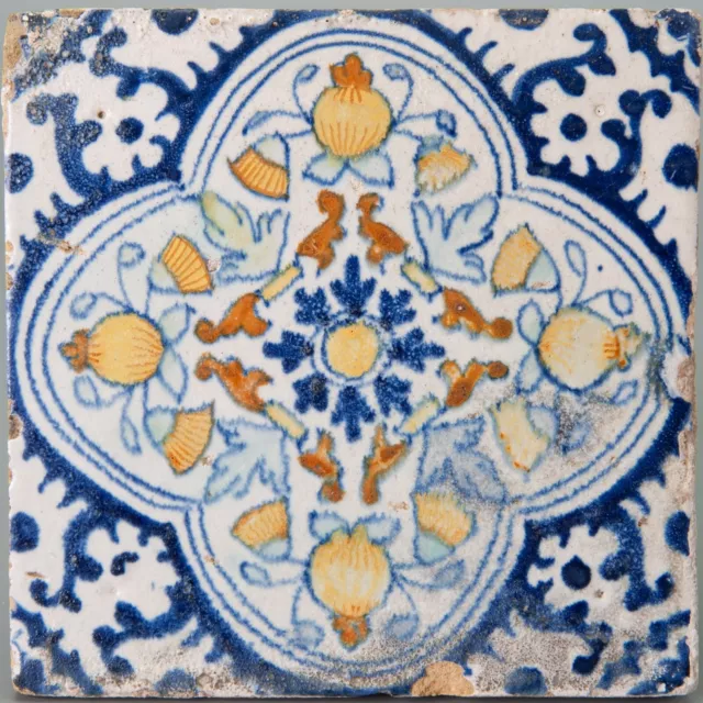 Nice Dutch Delft polychrome ornament flower tile,first half 17th ct. pompadour.