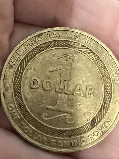 Vintage One Dollar Gaming Token Coin Mandalay Bay Resort Las Vegas NV 2