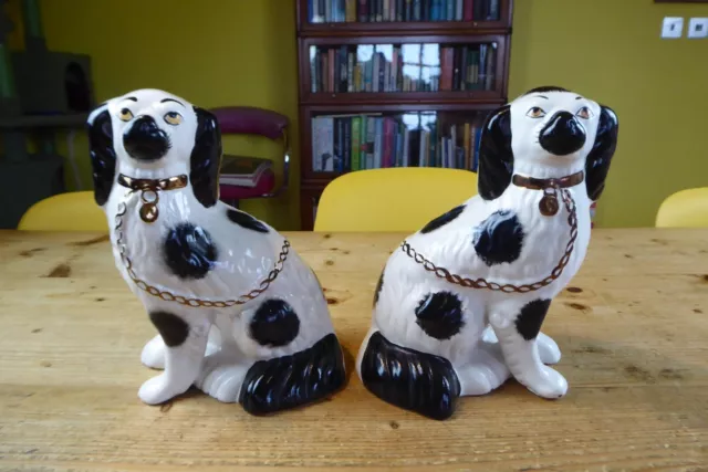 A Pair Of Vintage Black & White Staffordshire Pottery Wally Dogs 9" high