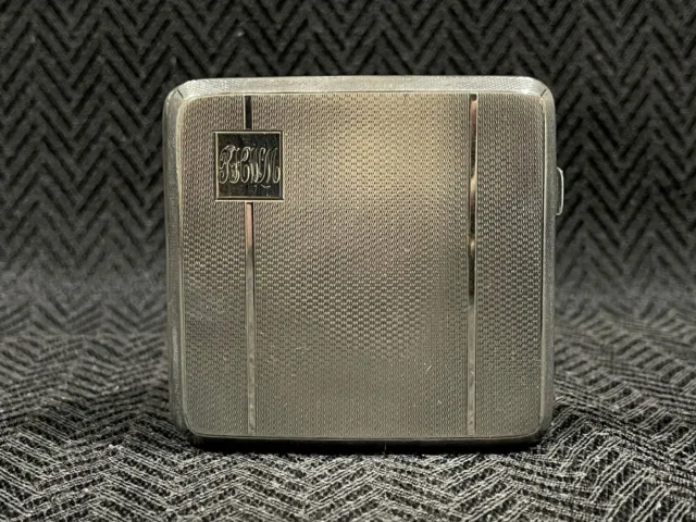 A Art Deco sterling silver cigarette case - hallmarked Birmingham - TW 118g