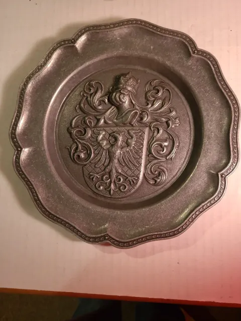 Antique Spain Shield  Pewter Plate embossed with crown and knight helmet.