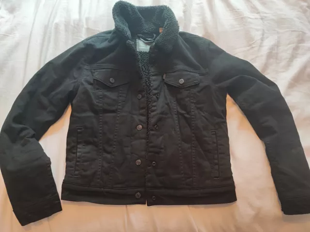 Levi’s, Corduroy Fleece Lined trucker jacket Good condition size Small. Black.